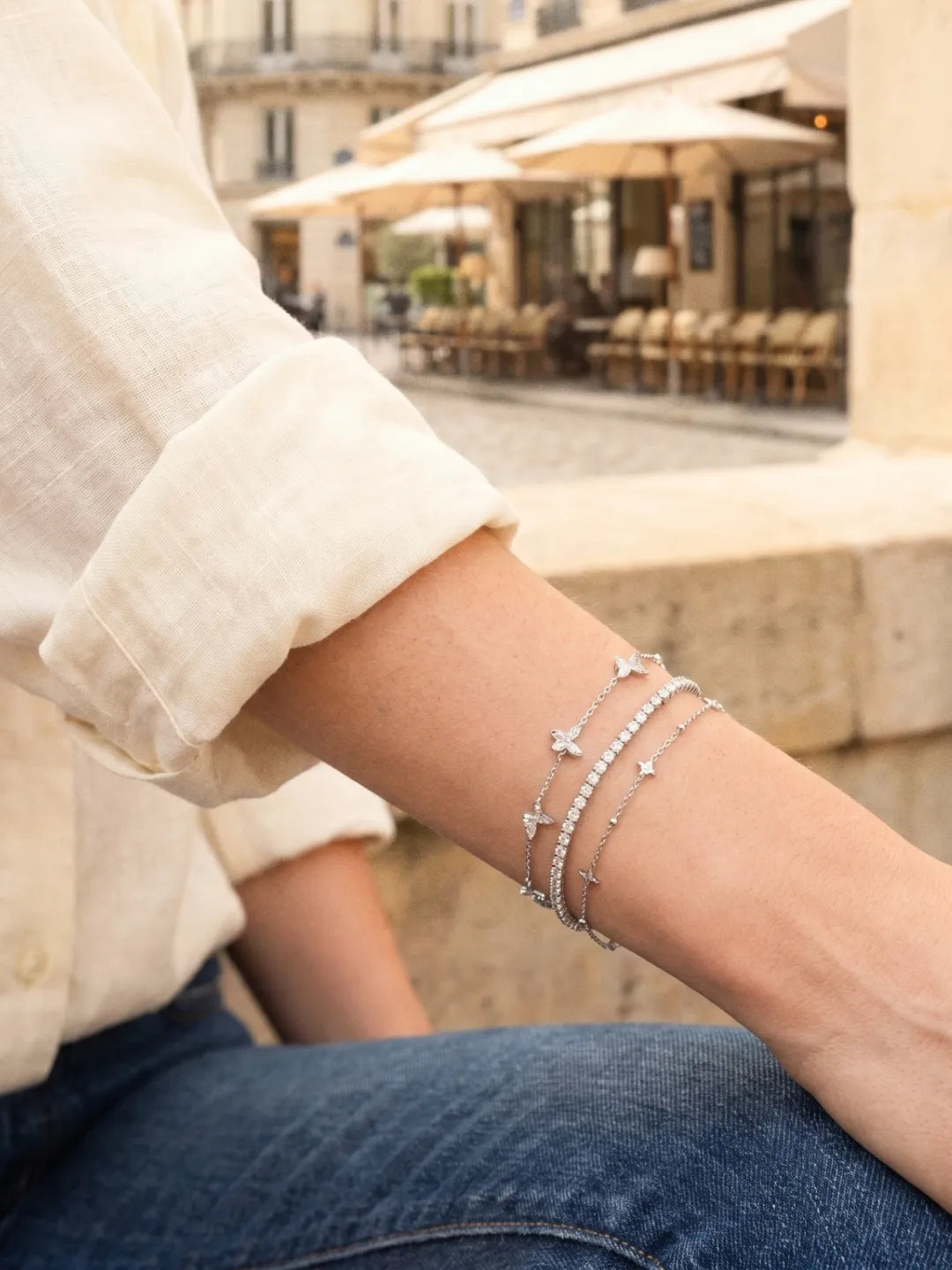 Moissanite tennis bracelets stacked on the wrist