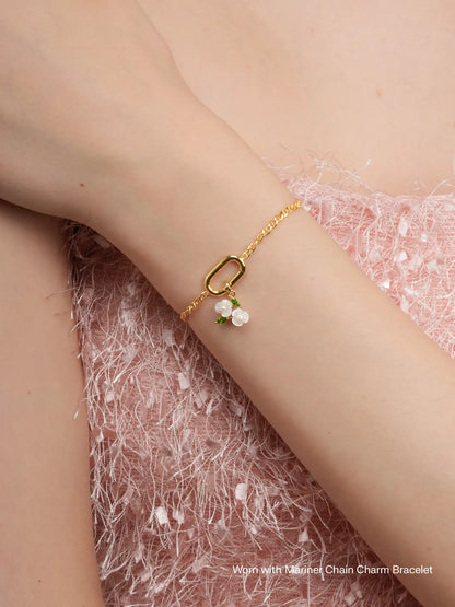 Carved Snowdrop Charm Worn With 18K Gold – Mondays Made Flower & Birthstone Jewelry Singapore