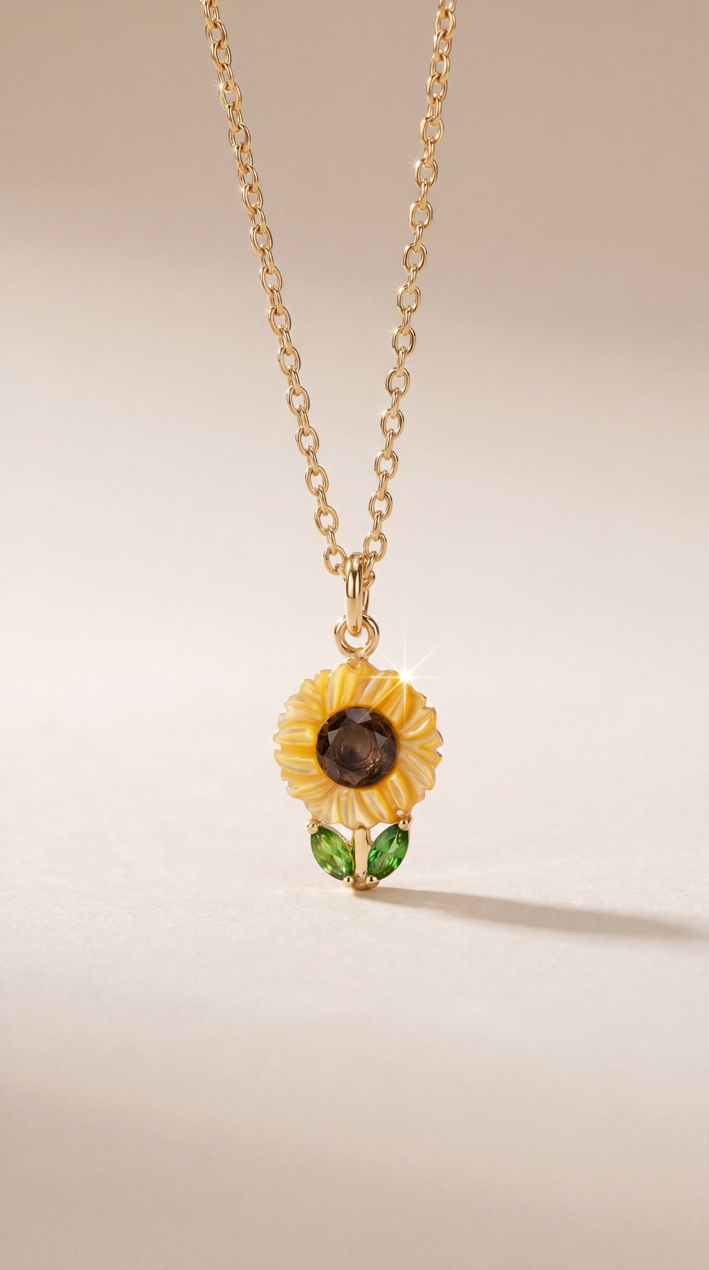 Close-up macro of Carved Sunflower pendant showing carved petals and gemstones