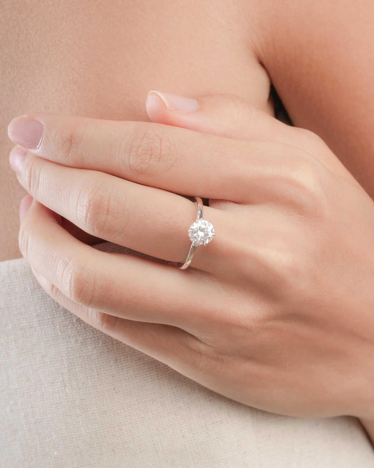 Solitaire Moissanite Arch Ring worn on the hand