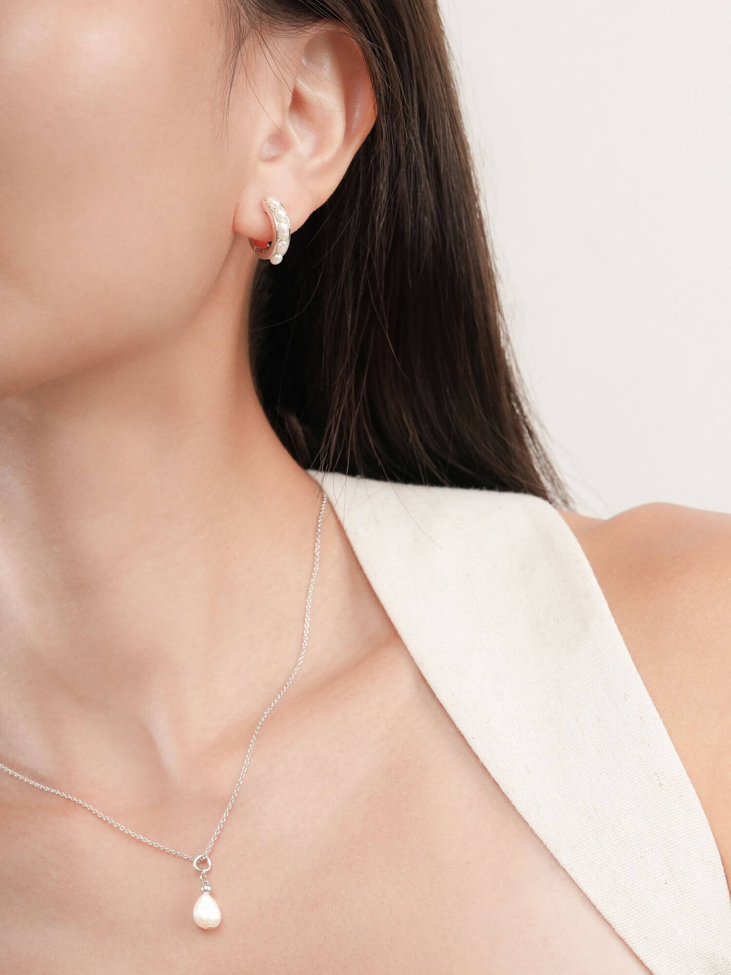 Baroque Pearl Row Huggie Earrings