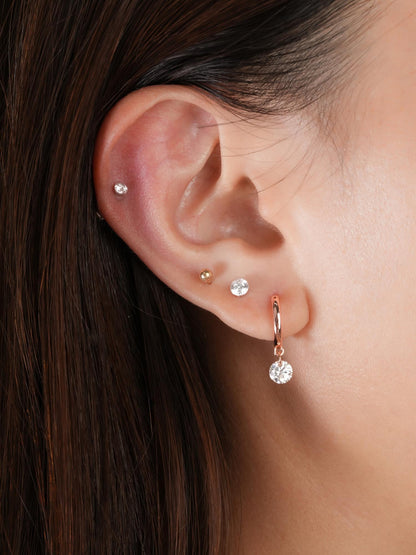 Floating Moissanite Huggie Earrings 18K Rose Gold (3) – Mondays Made Flower & Birthstone Jewelry Singapore