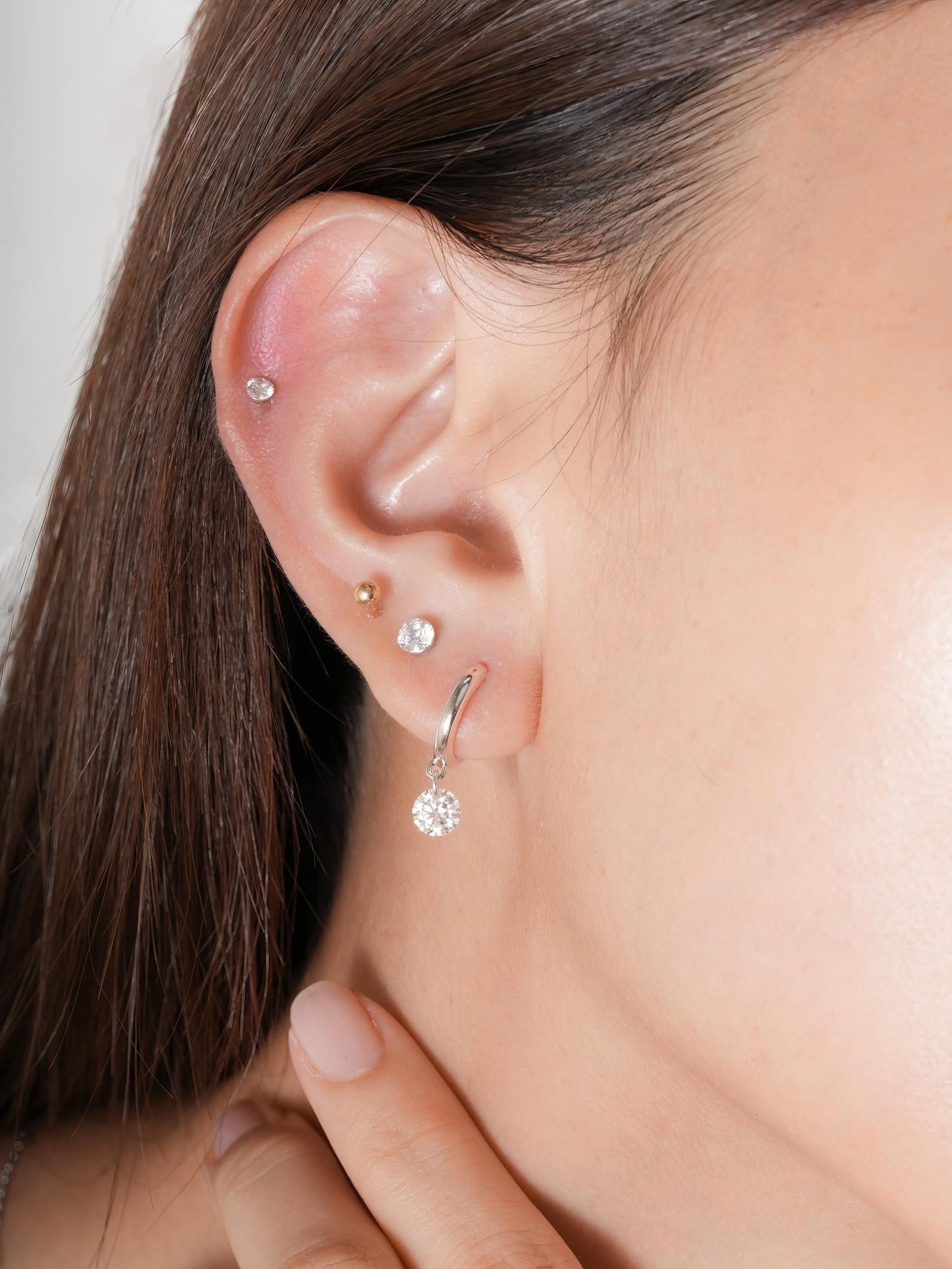 Floating Moissanite Huggie Earrings